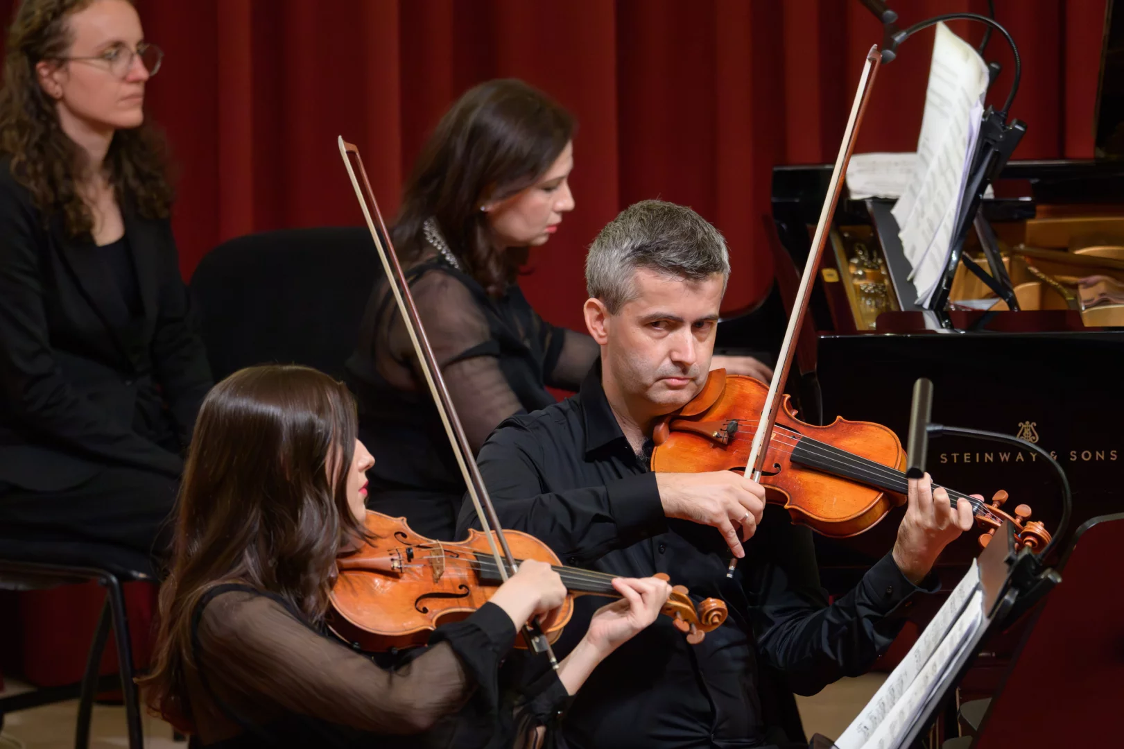 Vira Zhuk and Peter Mosorjak (violins)